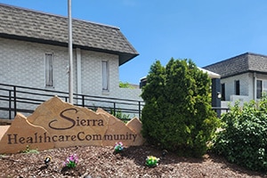 The front of the Sierra facility with white paint